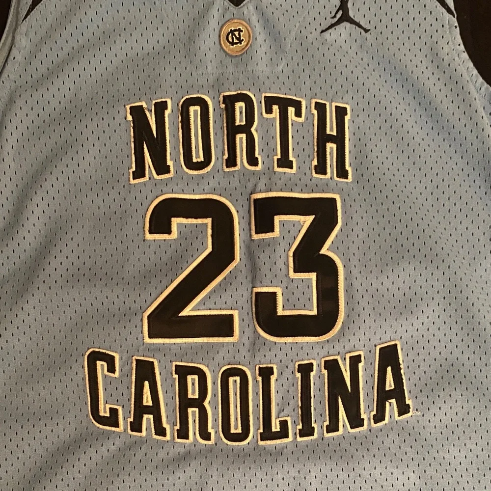 Jordan Carolina Blue and Black Basketball Jersey